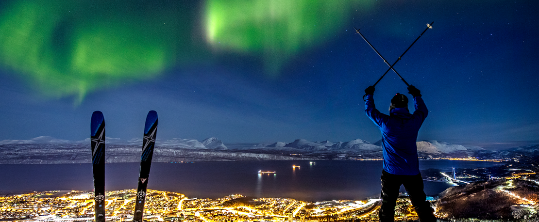 Narvik city and aurora borealis
